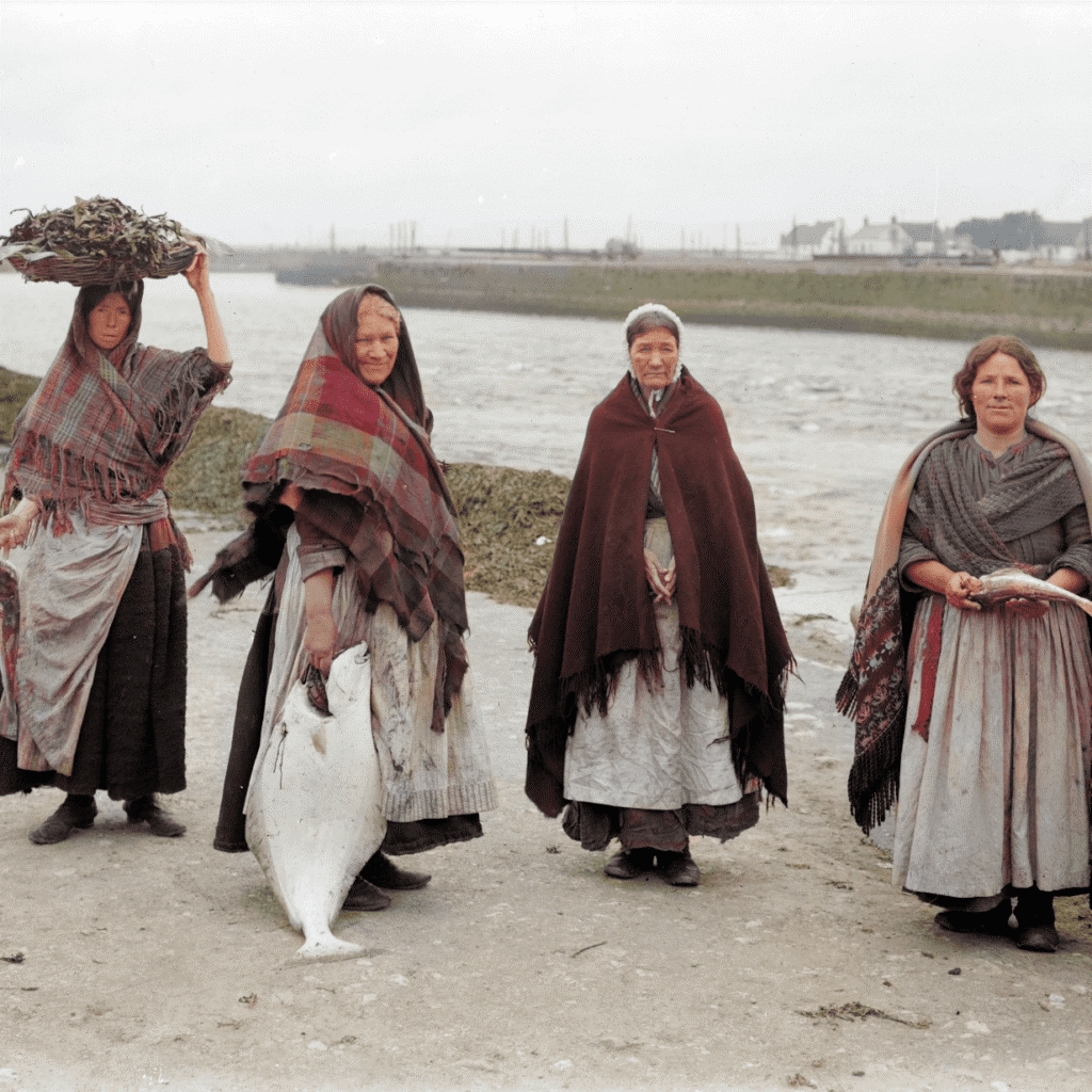 Photo: Rob Cross Photography/ restored and colourised 1905 Eason Photographic Collection photo features four women selling fish on the Spanish Parade, located on the Spanish Arch side of the Claddagh in Galway City.